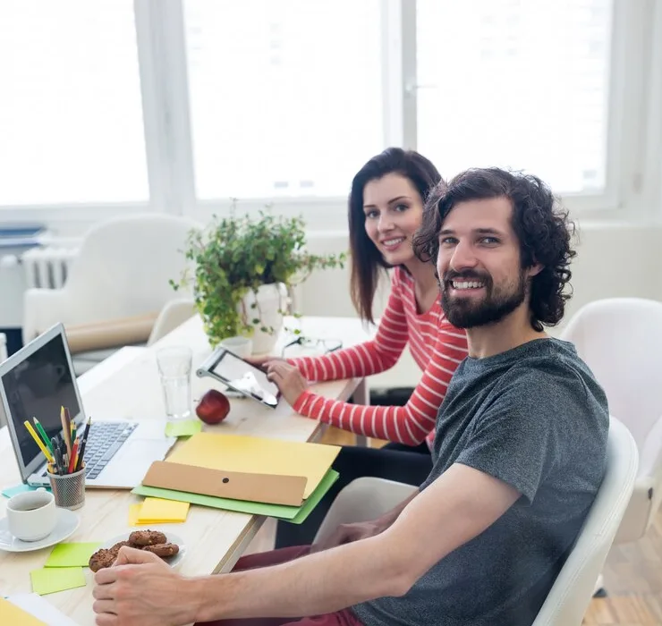 About Us 1 male female graphic designers working together 1170 919
